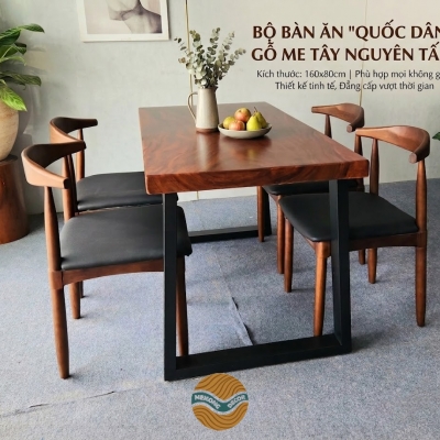 Bàn ăn gỗ me tây chân sắt hình thang kèm 4 ghế bull bọc đệm đen