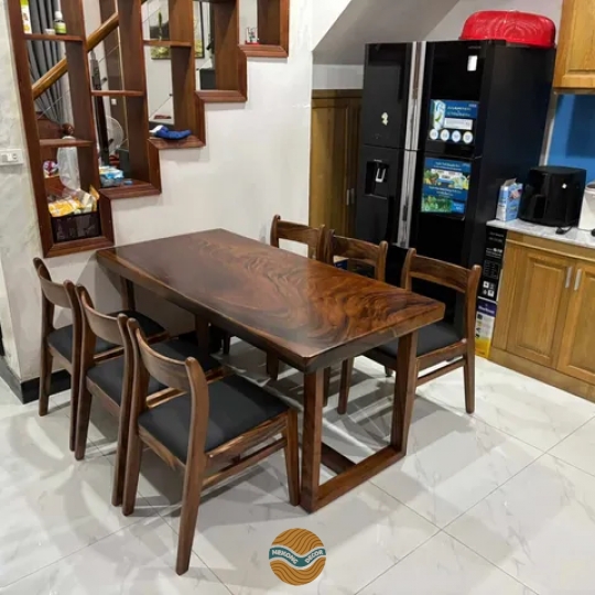 Bàn ăn gỗ me tây chân chữ T kèm 6 ghế bella me tây bọc nệm đen